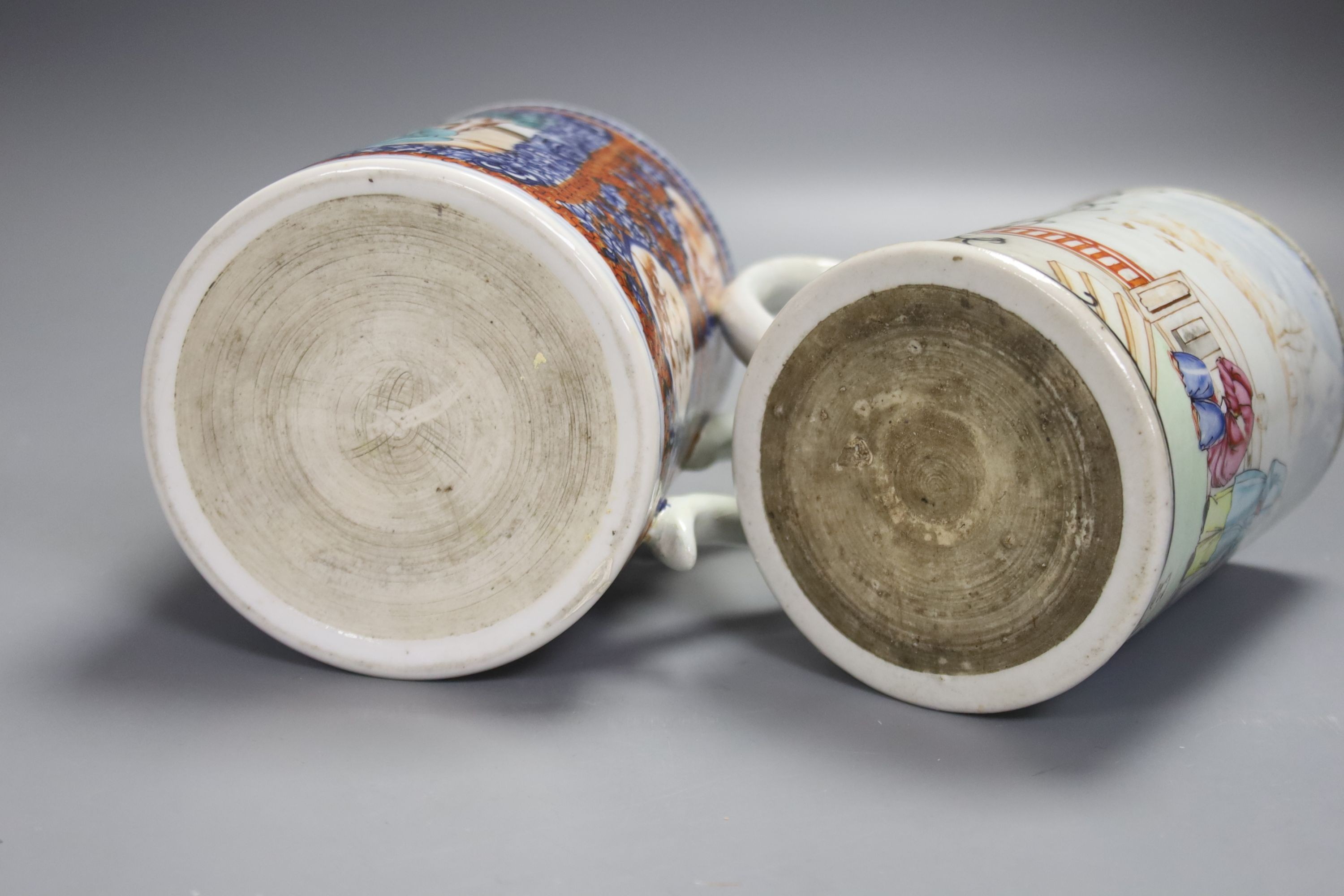 Two large 18th century Chinese famille rose export mugs, height 13.5cm